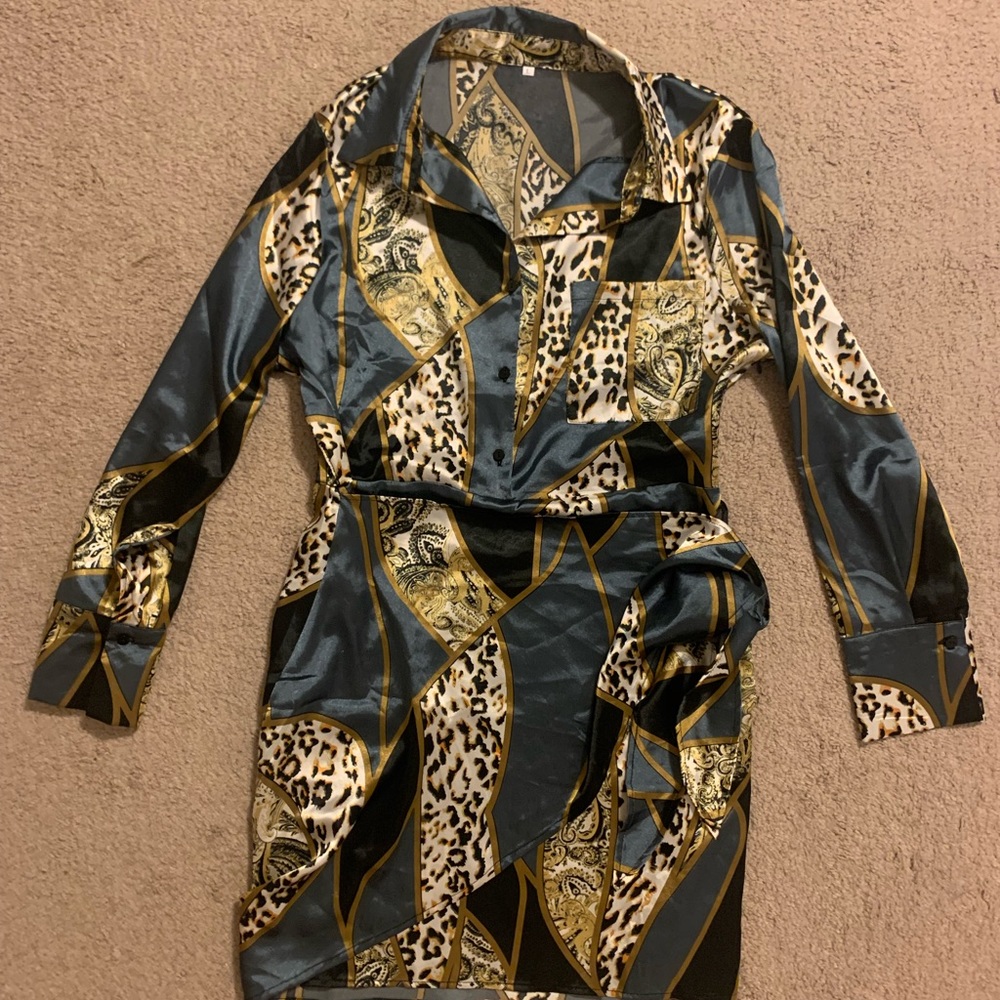 Patterned, collared faux wrap dress. Never worn